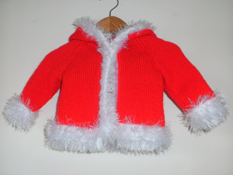 Hand knitted fur trimmed hooded coat image 1