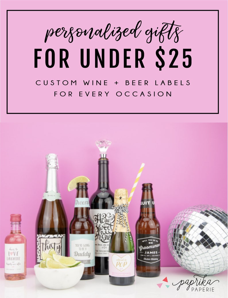 May include: A collection of personalized wine and beer bottles with custom labels. The labels feature various designs and text, including "Thirty", "You're Going to Be a Daddy", "Home Sweet Home", "Pop", and "Groomsman James". The bottles are arranged on a pink surface with a disco ball in the background. The text "personalized gifts for under $25" and "custom wine + beer labels for every occasion" is displayed at the top of the image.