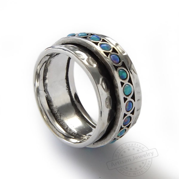 Hammered silver and Opal spinner ring