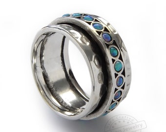 Hammered silver and Opal spinner ring