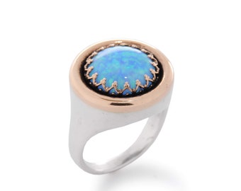 Oval Opal ring with Rose Gold braid