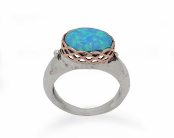 Oval Opal ring with Rose Gold braid