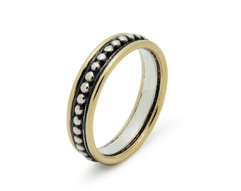Dotted Silver ring with Gold Rim