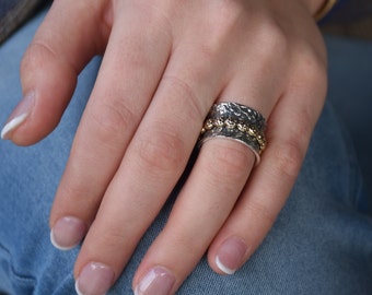 Silver and Brass Floral Spinner ring