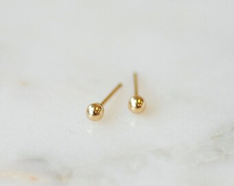 design of gold earrings & ear tops