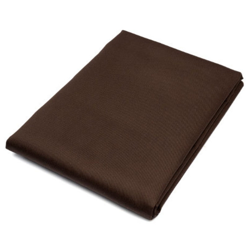 May include: A brown fabric tablecloth with a subtle textured pattern.