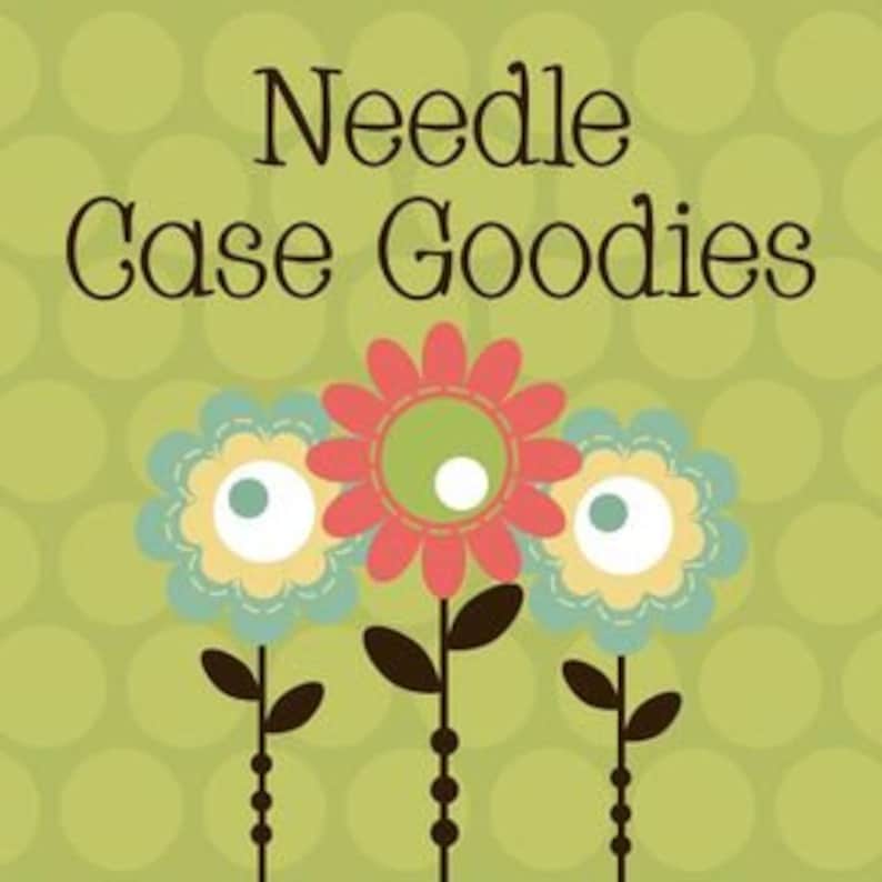May include: A graphic with the text "Needle Case Goodies" above three stylized flowers. The flowers have blue, yellow, and red petals with green and white centers. The background is a light green with darker green polka dots.