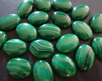 Green stone with black stripes deals