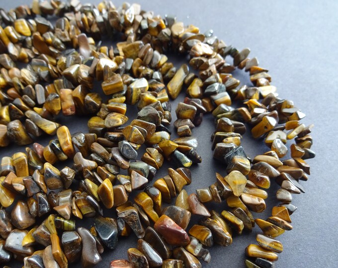 34 Inch Natural Tigereye Bead Strand, Heated, 8-9mm Tiger Eye Chip Gemstones, About 275 Stones Per Strand, Polished Tiger's Eye Drilled Chip