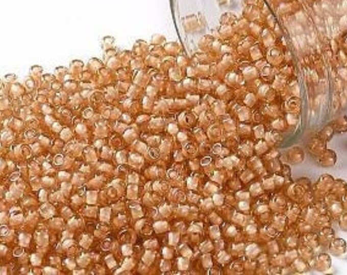 11/0 Toho Seed Beads, AB Crystal / Moccasin Lined (923), 10 grams, About 1100 Round Seed Beads, 2.2mm with .8mm Hole, Inside Color Finish
