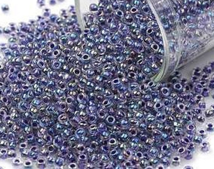 11/0 Toho Seed Beads,  Dark Purple Lined Crystal Rainbow (774), 10 grams, About 1100 Round Seed Beads, 2.2mm with .8mm Hole, Rainbow Finish