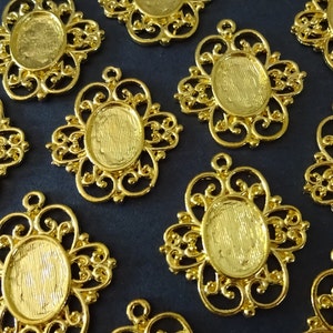 14x10mm Alloy Metal Pendant Floral Setting, 31mm Overall Size, Oval Setting, Fits 14x10mm Oval Stone, Gold Color, Antiqued Tibetan Style