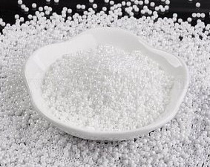 11/0 Toho Seed Beads, Opaque Rainbow AB White (401), 10 grams, About 933 Round Seed Beads, 2x1.5mm with .5mm Hole, AB Finish