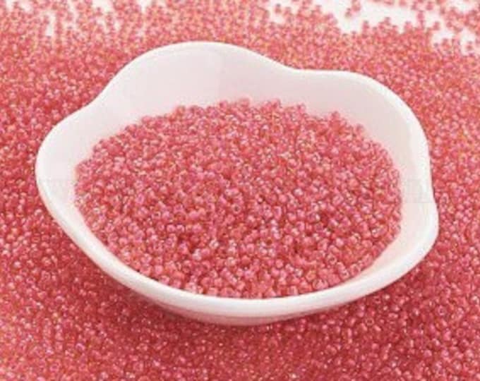 11/0 Toho Seed Beads, Luminous Light Topaz/Neon Pink Lined (979), 10 grams, About 900 Round Seed Beads, 2x1.5mm with .5mm Hole, Inside Color