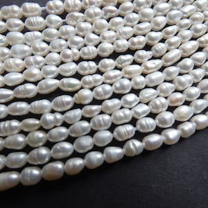  qianho Natural Rice Shape Freshwater Pearl Beads,Real