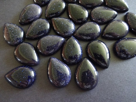 Blue gem shop with gold flecks
