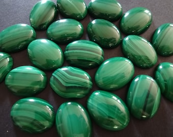Green stone with black best sale stripes