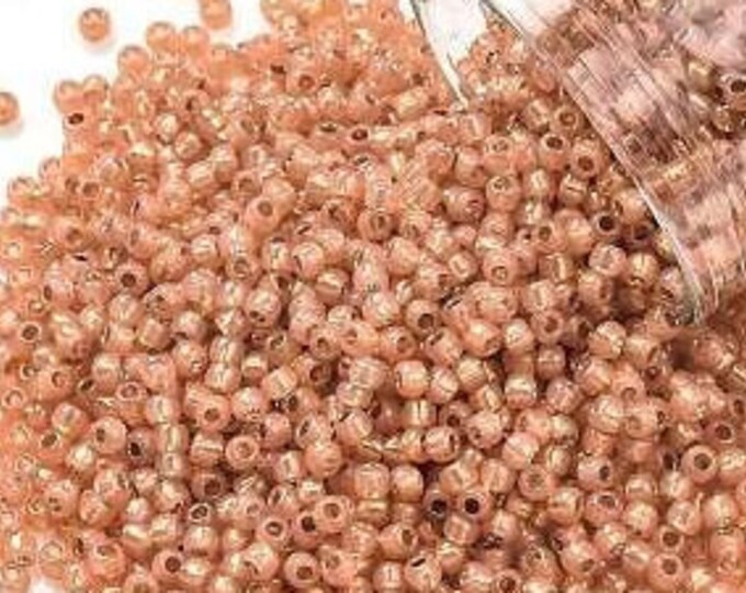 11/0 Toho Seed Beads, Silver Lined Milky Grapefruit (2112), 10 grams, About 1103 Round Seed Beads, 2.2mm w/ .8mm Hole, Silver Lined Finish