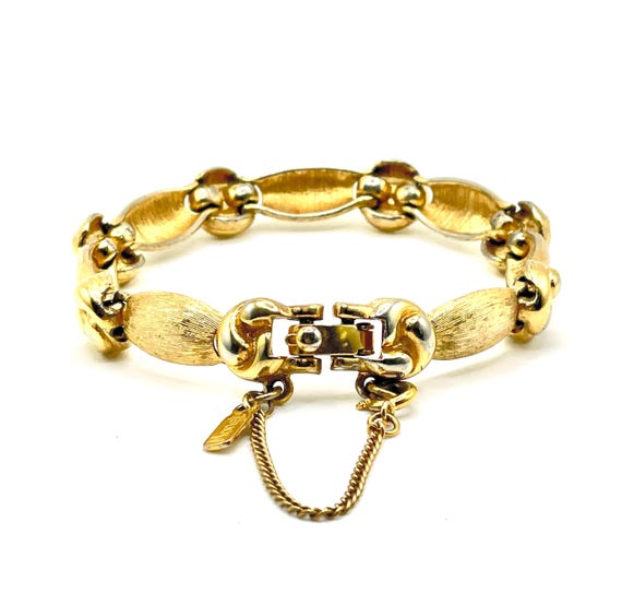 Vintage Monet Gold Plated Love Knot Bracelet w/ Safety Chain – Circa 1980s