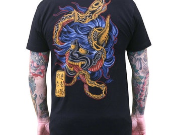 May include: Black t-shirt with a graphic print of a blue and red demon face with a yellow snake wrapped around it. The text "花を咲かせ" is printed on the shirt.