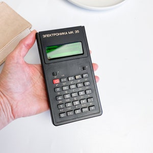 Vintage engineering calculator Elektronika MK-35, 8-digit pocket calculator