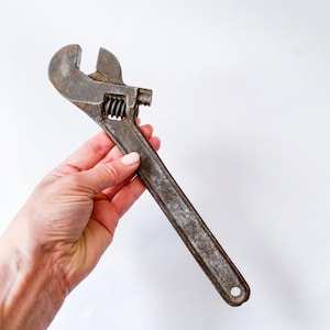Antique old rustic iron vintage adjustable wrench, spanner old country home decor, vintage rusty patina, collectible 1950s rusty patina