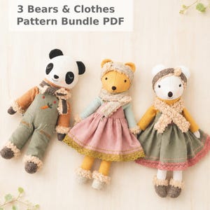 May include: Three plush bear dolls with embroidered features, wearing textured scarves and outfits. The panda wears olive overalls with a carrot detail, while the other two wear dresses in pink and olive green. Text reads: 3 Bears & Clothes Pattern Bundle PDF.