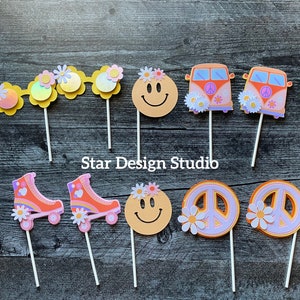 May include: Set of 10 colorful cake toppers featuring peace signs, smiley faces, roller skates, and vintage vans. The toppers are perfect for a groovy themed party.