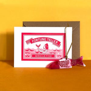 Set regalo con decorazione acrilica "Miracle Fish Riso Card" e cartomante