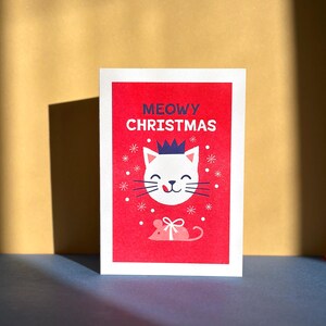 Tarjeta con estampado de risografía con gato navideño maullando / Arte vintage / Risoimpresión / Risografía / Tarjeta en blanco / Sobre Kraft / Tarjeta de felicitación retro / Festiva