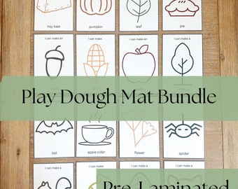 May include: A set of 12 pre-laminated play dough mats featuring fall-themed images. The mats are white with black outlines and include images of a hay bale, pumpkin, leaf, pie, acorn, corn, apple, tree, bat, apple cider, flower, spider, squirrel, a ball of yarn, mushroom, and a wolf. The text "Play Dough Mat Bundle" and "Pre-Laminated" are printed on the mats.