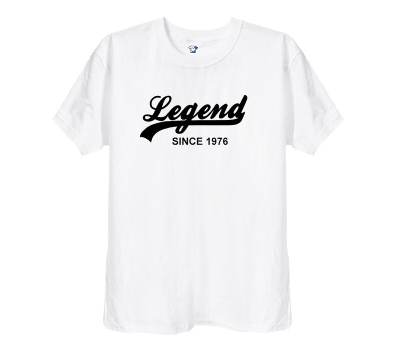 May include: White t-shirt with black text that reads "Legend Since 1976".