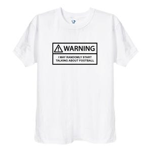 May include: White t-shirt with a black warning sign that says "WARNING I MAY RANDOMLY START TALKING ABOUT FOOTBALL"