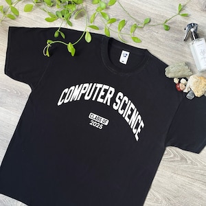 May include: Black t-shirt with white text that reads "COMPUTER SCIENCE CLASS OF 2025".