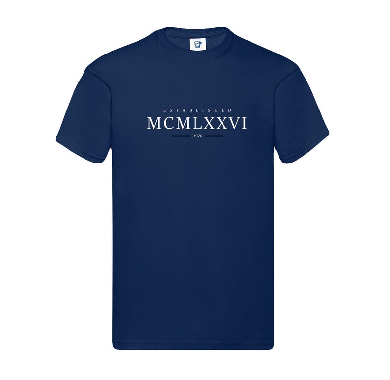 May include: A navy blue t-shirt with white text that reads "ESTABLISHED MCMILXXVI 1976".