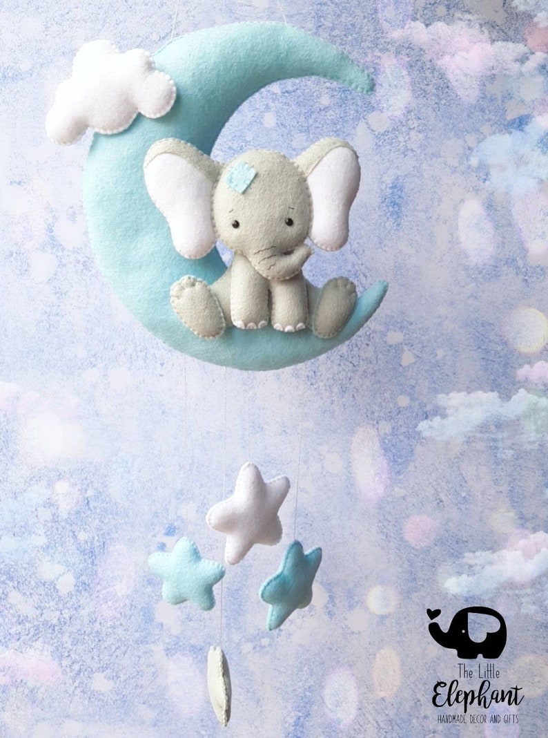 Elephant sitting on pale blue moon, nursery wall hanging