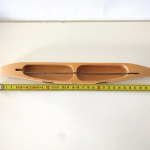 Rare double weaving shuttle