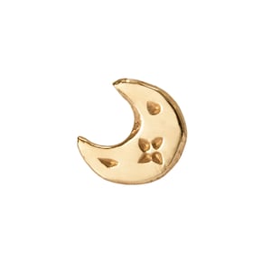 May include: A gold crescent moon earring with a small star design.