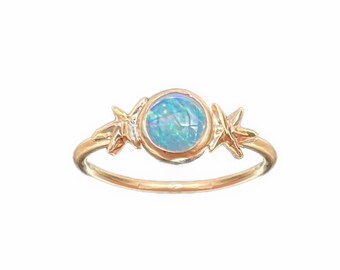 6. Opal Lyra Ring