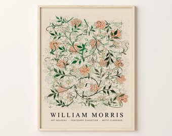Op de afbeelding: Een vintage poster met een bloemenontwerp in tinten groen, wit en oranje. De poster heeft de tekst "William Morris" en "Art Nouveau - Centenary Exhibition - Motif Classique" onderaan.