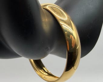 Vintage Monet Gold Tone Concave Bangle Bracelet Signed Designer Jewelry Sleek Minimalist Slip On Statement Elegant Classic Bold 1980s 1990s