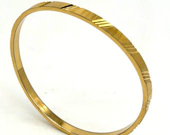 Vintage Monet Gold Tone Etched Bangle Bracelet Signed Geometric Diagonal Stripe Textured Slim Stackable Designer Jewelry Retro 1970s 1980s