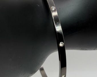 Vintage Monet Gunmetal Bangle Bracelet 12 Inlaid Clear Rhinestones Signed Designer Jewelry Minimalist Stackable Large Wrist 8 Inch Statement