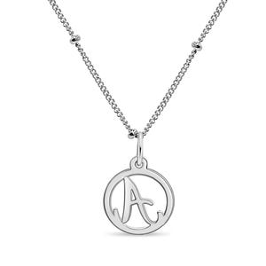 May include: A silver necklace with a circular pendant featuring a stylized letter 'A'.