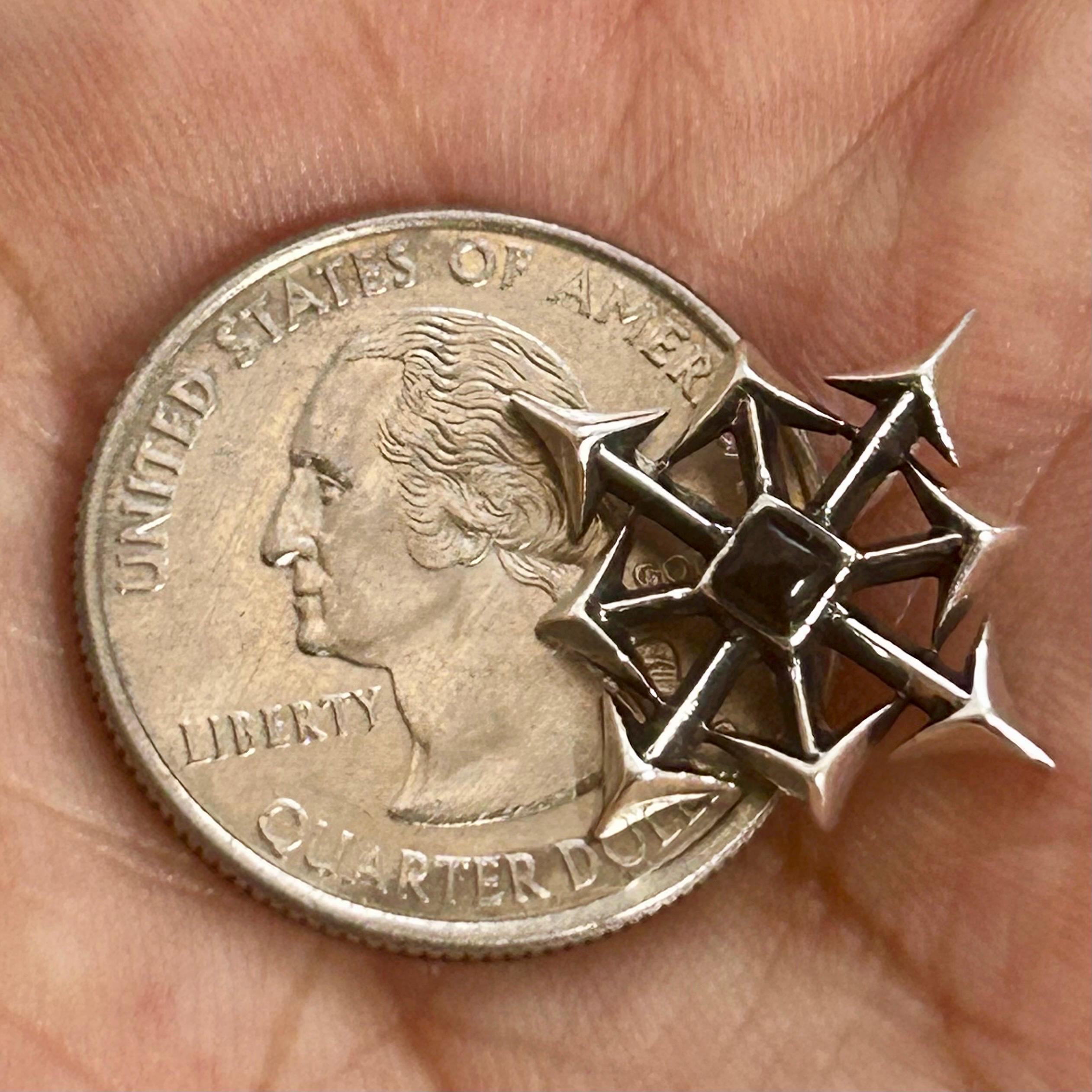 Elegant Chaos: Sterling Silver Chaos Star Pendant With