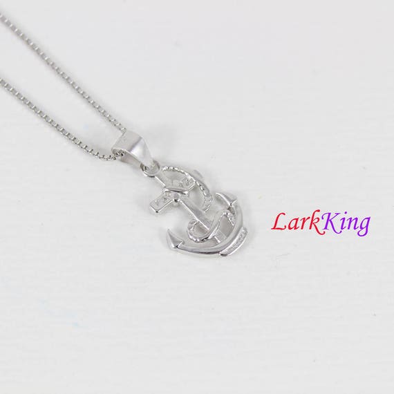 Extra Small Looped Cross Pendant Sterling Silver, Chain Included Extra Small Looped Cross Pendant Sterling Silver, Chain Included