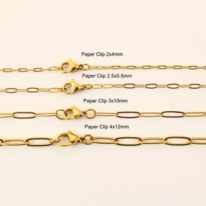 May include: Four gold-colored paper clip chain necklaces of varying sizes are displayed. Each chain has a lobster clasp. The sizes are labeled as 2x4mm, 2.5x5.5mm, 3x10mm, and 4x12mm. The chains are on a light background.