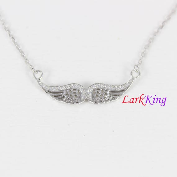 Sterling Silver Diamond Open-Work Wing Pendant Sterling Silver Diamond Open-Work Wing Pendant