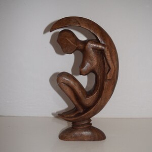 The Moon Goddess Naked Young Woman In Wood Sitting In A Crescent Moon Handcrafted Indonesian Wood Sculpture