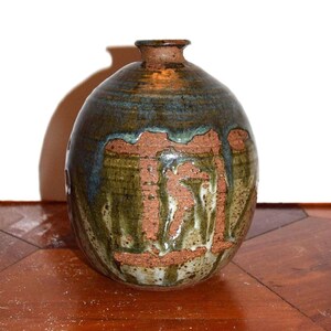 Gorgeous Mid-Century Artist Signed American Art Pottery Vase Drip Glaze Over Burn Sienna  Signed Isbester, dated 1975.